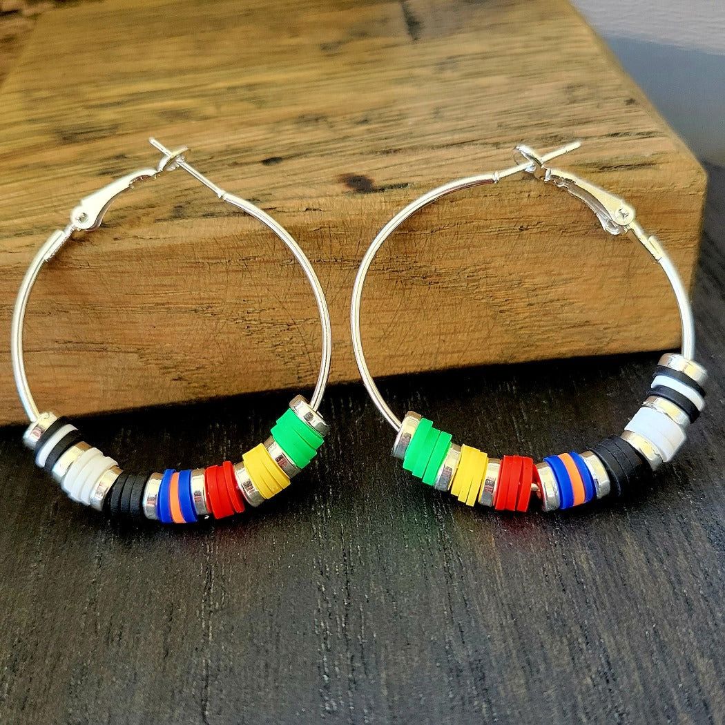 Wire hoop earrings with the colors of the racing flags.