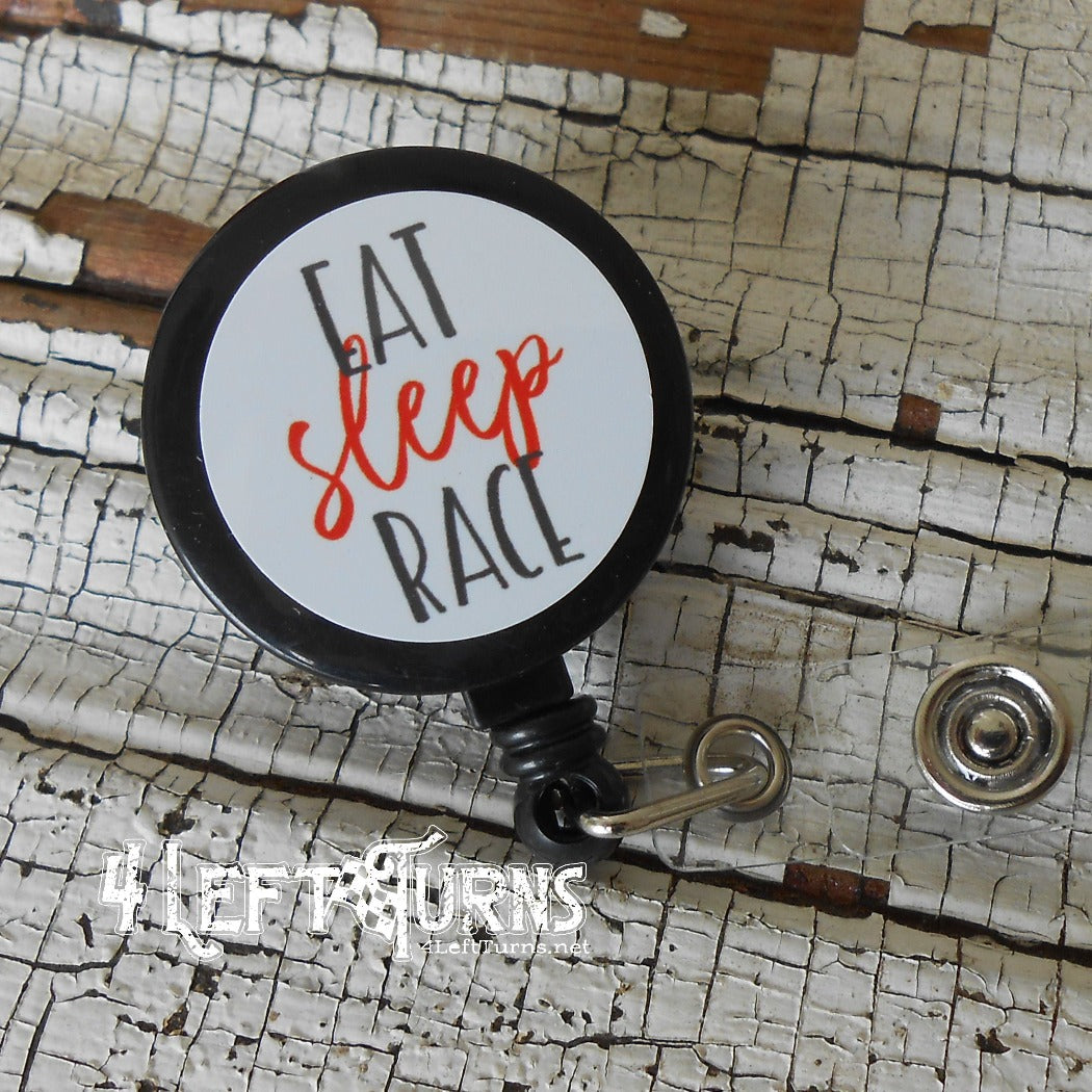 Eat sleep race badge reel clip.