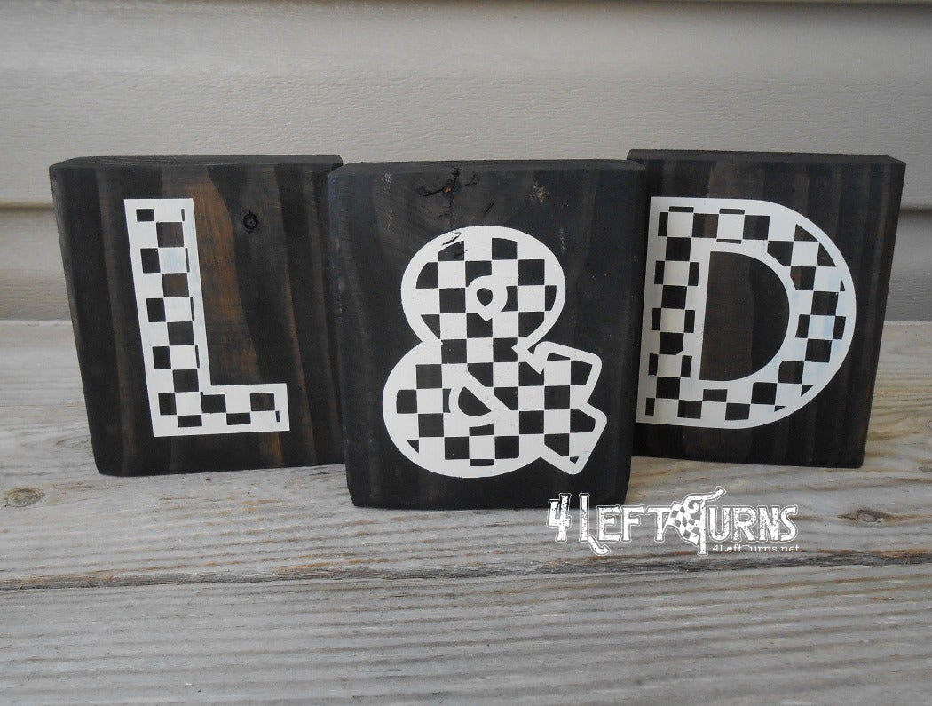 Blocks of wood with painted on decoration.