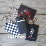 Racing themed credit card/identification holder key rings.