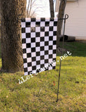 Black and white checkered garden flag.