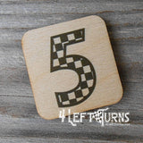 Checkered number 5 wooden magnet.