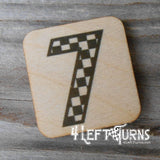 Checkered number 7 wooden magnet.