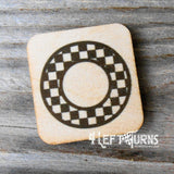 Checkered letter O wooden magnet.