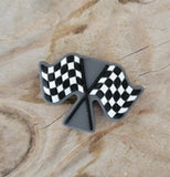 Crossed checkered flags silicone focal bead.