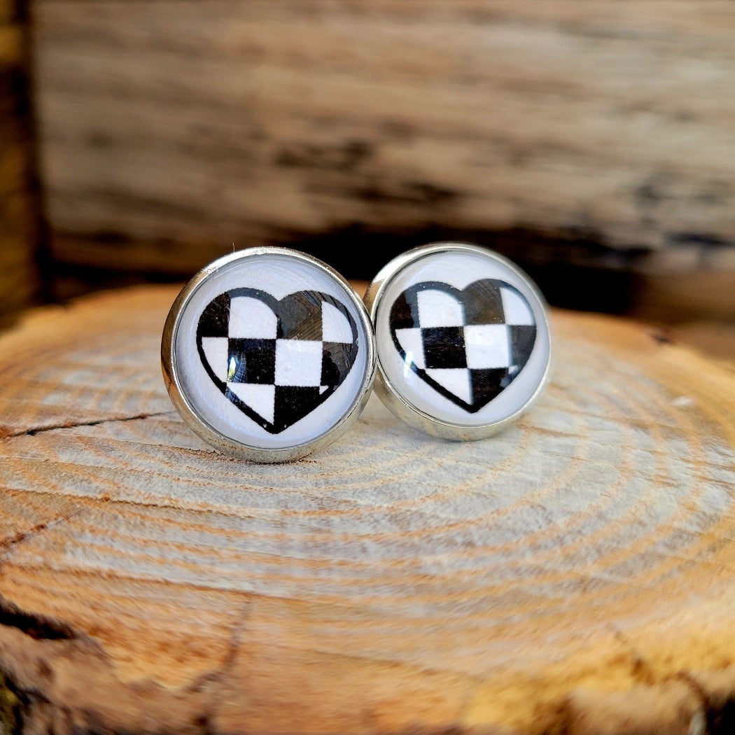 Checkered heart post style earrings.