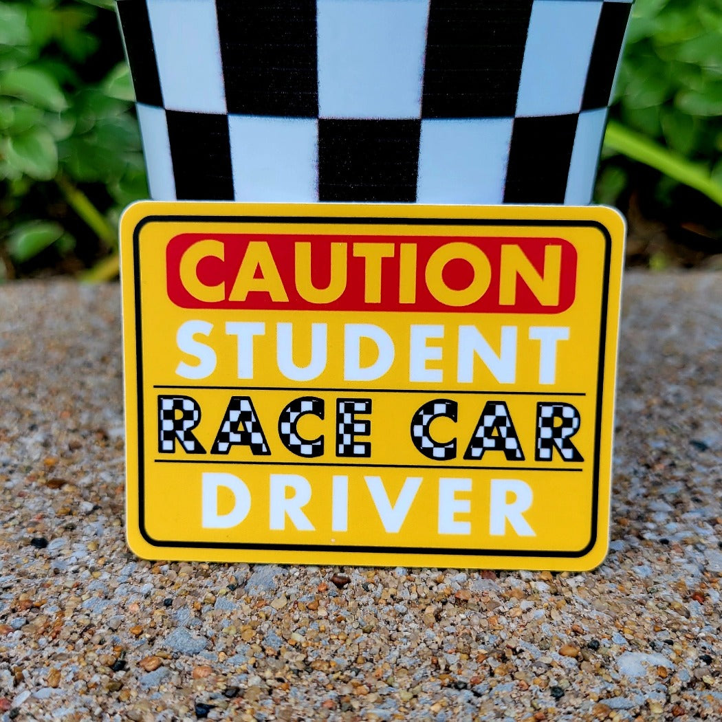 Caution student race car driver sticker.