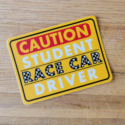 Caution Student Race Car Driver sticker.