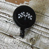 Checkered flag badge reel clip.