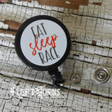 Eat sleep race badge reel clip.