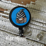 Gnome with blue background badge reel clip.