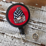 Gnome with red background badge reel clip.