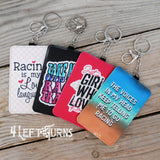 Racing themed credit card/identification holder key rings.