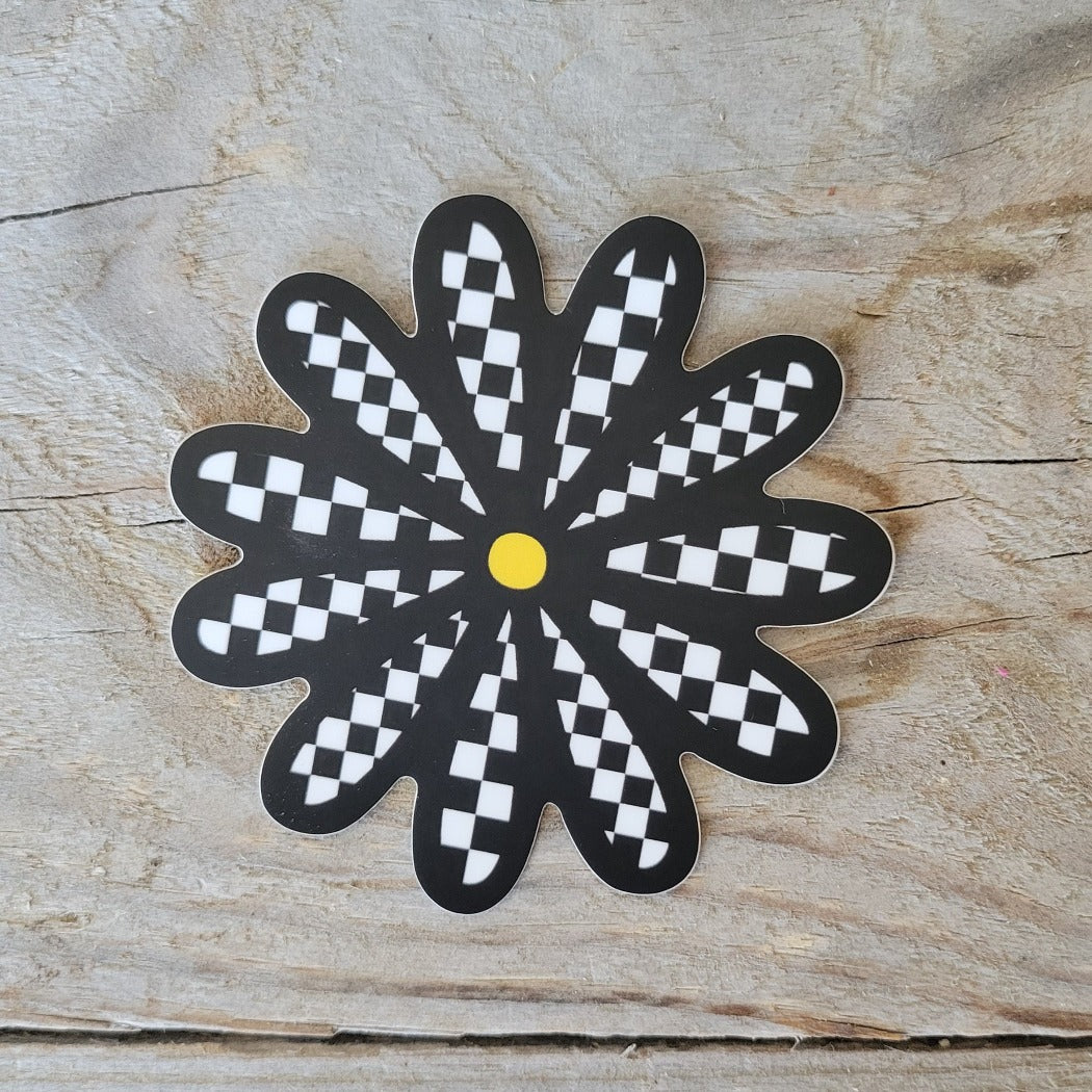 Checkered daisy sticker.