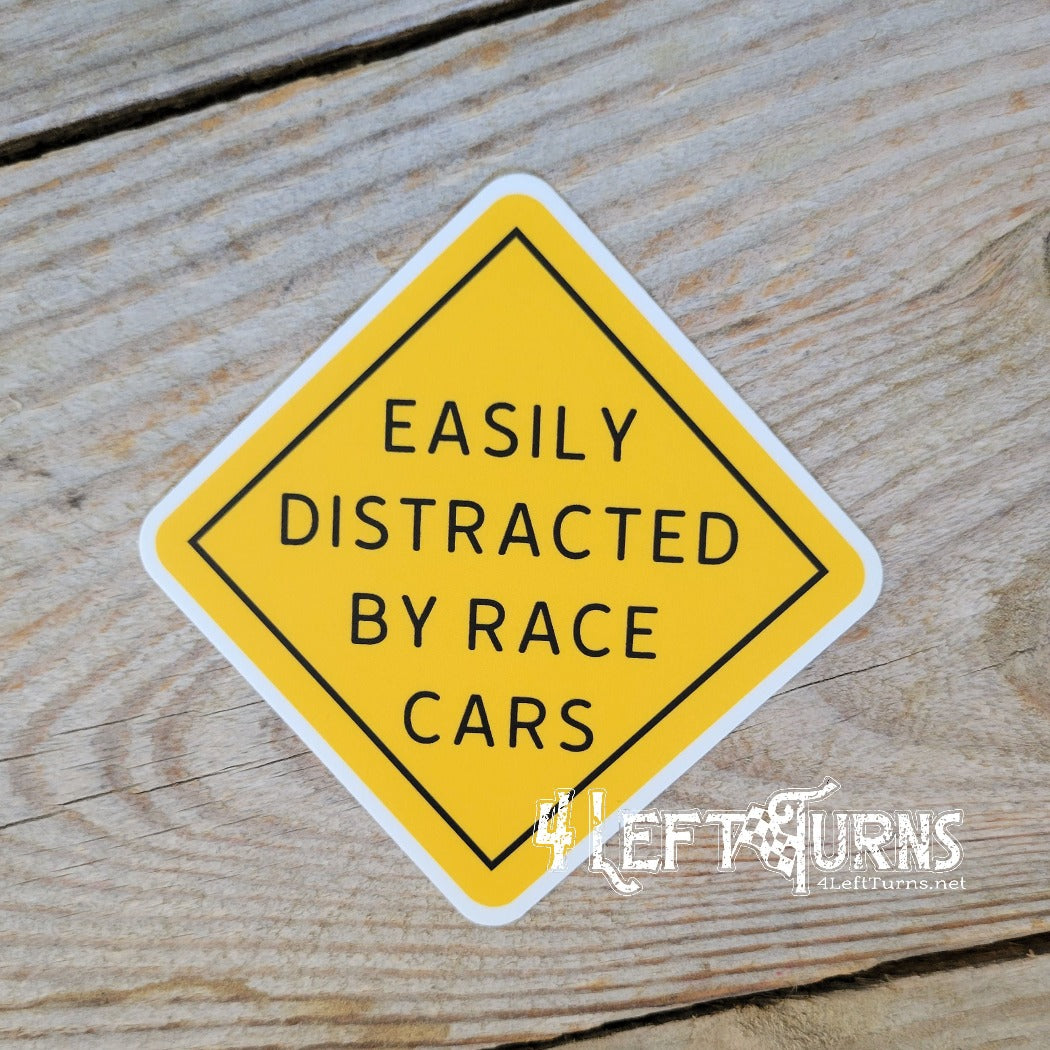Easily distracted by race cars sticker.