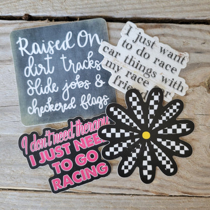Group of 4 racing stickers.