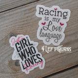 Pair of racing stickers.