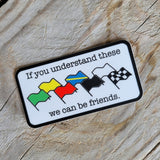 Racing sticker with racing flags that says if you understand these we can be friends.