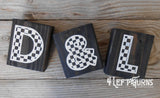 Wood blocks with painted on designs.