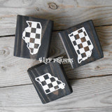 Wood blocks with black and white checkered states.