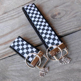 Black and white checked fabric key fobs.