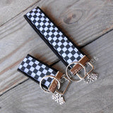 Black and white checked fabric key fobs.
