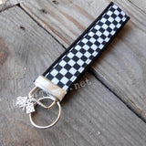 Black and white checked fabric key fobs.