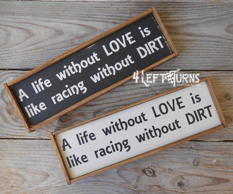 Wooden shelf sign that says A life without love is like racing without dirt.