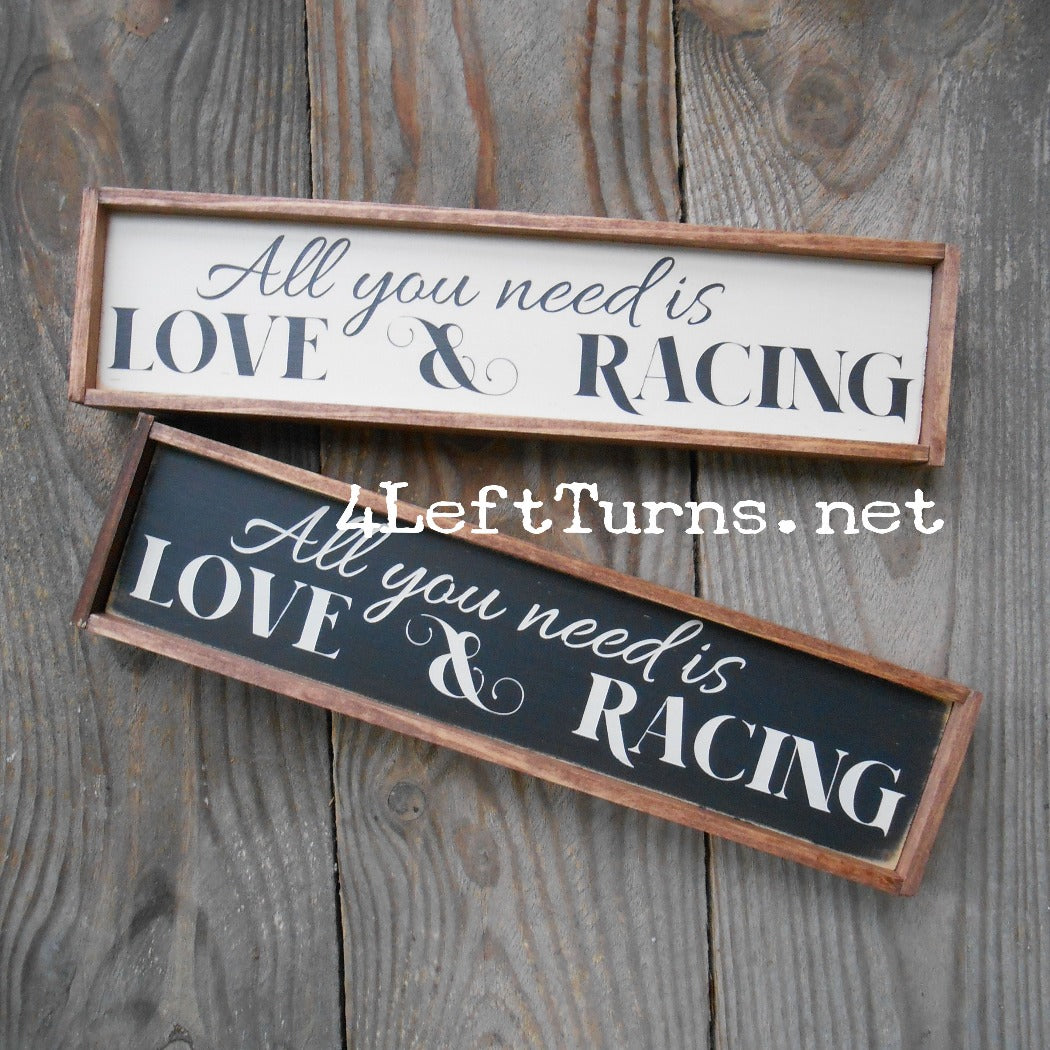 All you need is love and racing shelf sitter sign.