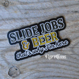 Slide jobs and beer racing sticker.