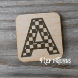 Checkered letter A wooden magnet.