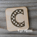 Checkered letter C wooden magnet.