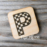 Checkered letter P wooden magnet.