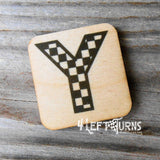 Checkered letter Y wooden magnet.